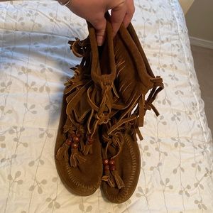 Leather Minnetonka boots with fringe and beads. Size 8.